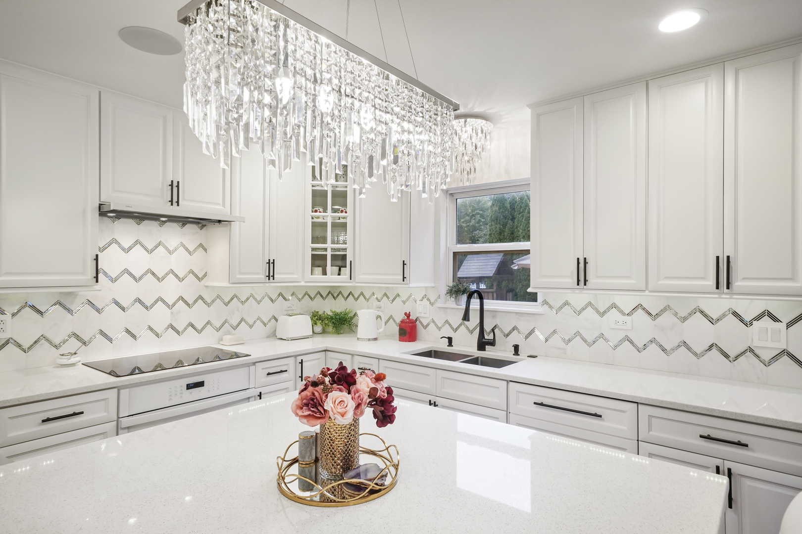 1916 Windstone Drive Plainfield, IL 60586 - Photo 21 of 50 a kitchen with white cabinets and window