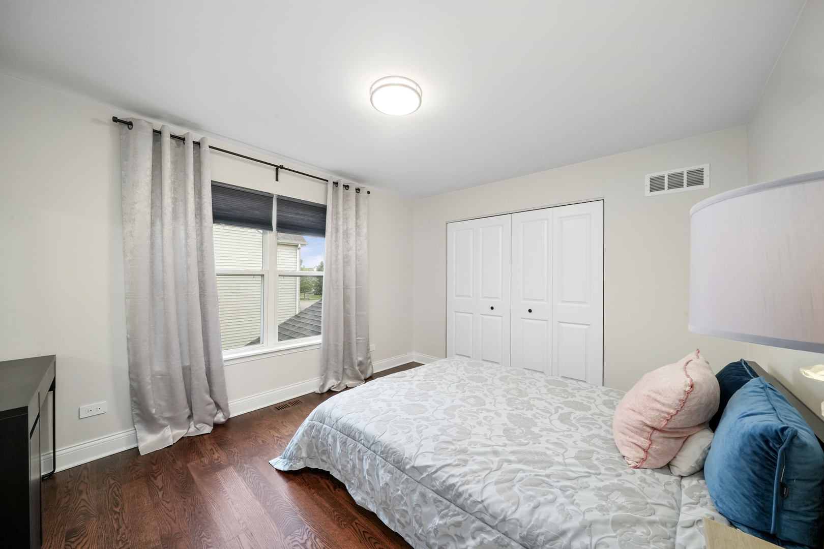 1916 Windstone Drive Plainfield, IL 60586 - Photo 38 of 50 a bedroom with a bed and a window