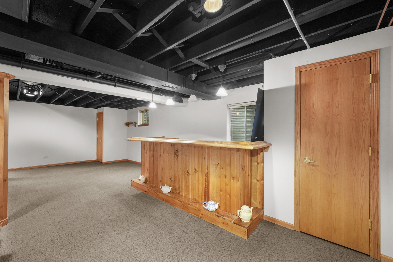 1916 Windstone Drive Plainfield, IL 60586 - Photo 39 of 50 a view of a room with wooden walls