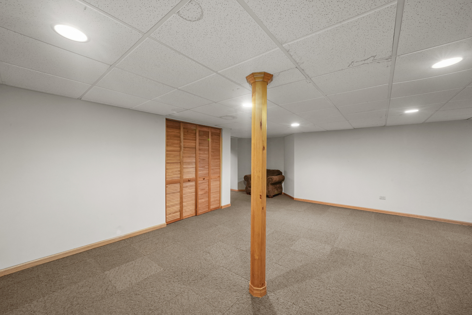 1916 Windstone Drive Plainfield, IL 60586 - Photo 40 of 50 a view of an empty room with a window