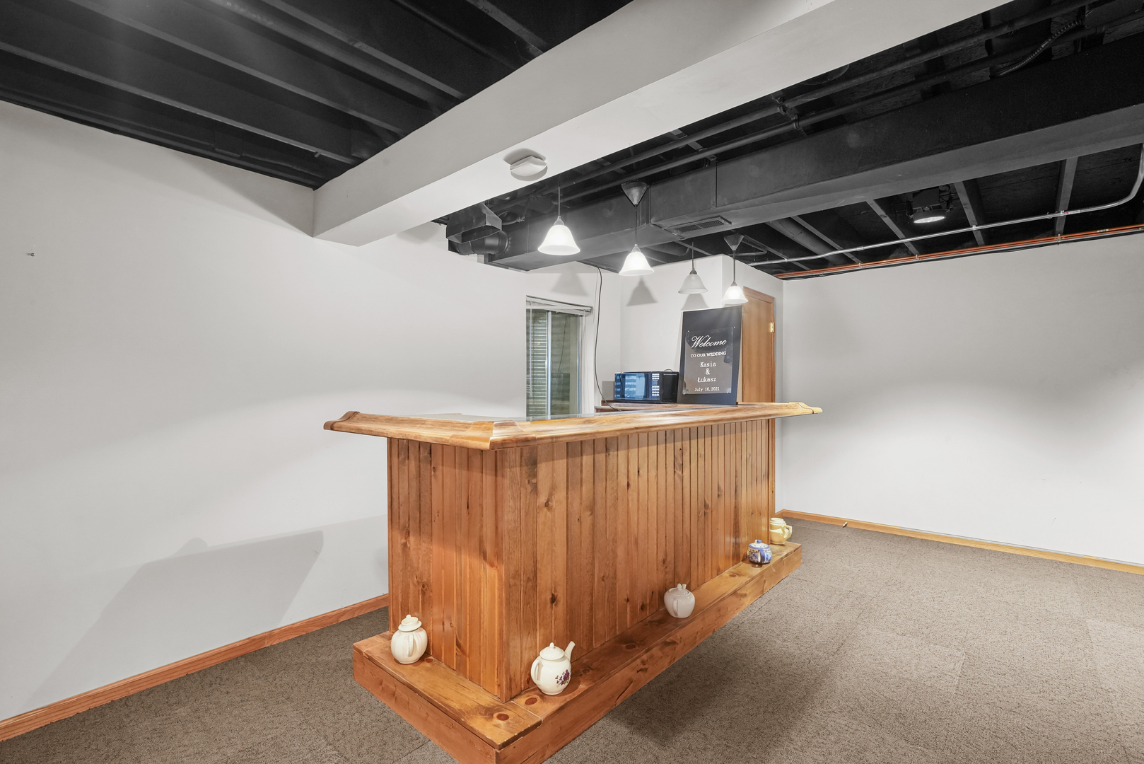 1916 Windstone Drive Plainfield, IL 60586 - Photo 42 of 50 a view of a room with wooden walls