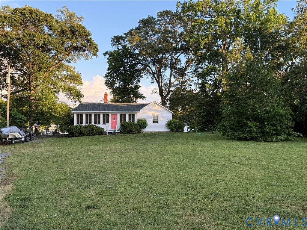 1686 Locust Grove Road Topping, VA 23169 - Photo 1 of 31 Ranch-style cottage featuring a large yard
