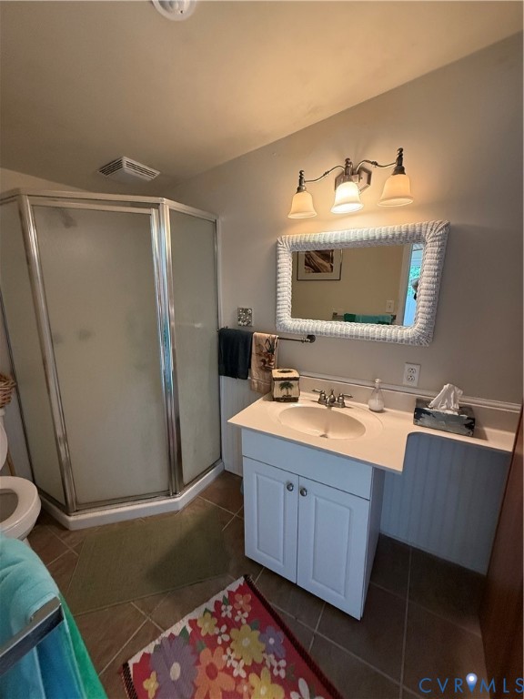 1686 Locust Grove Road Topping, VA 23169 - Photo 18 of 31 Full bath featuring vanity, a shower stall, and da