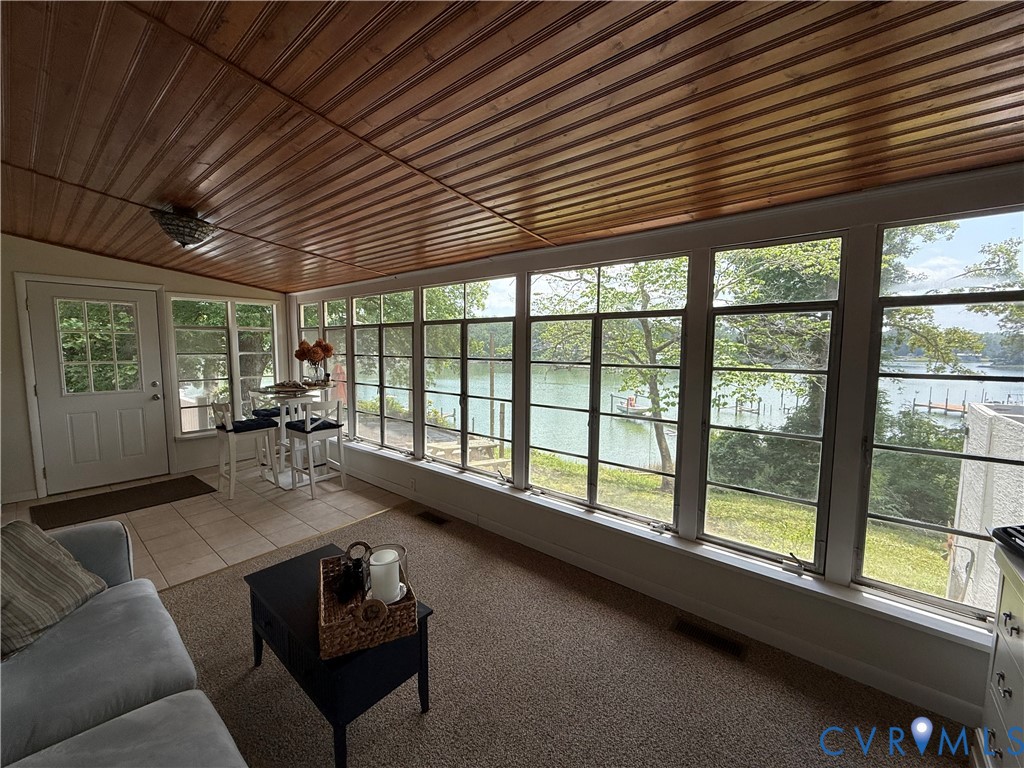 1686 Locust Grove Road Topping, VA 23169 - Photo 31 of 31 Sunroom / solarium featuring a water view, wood ce