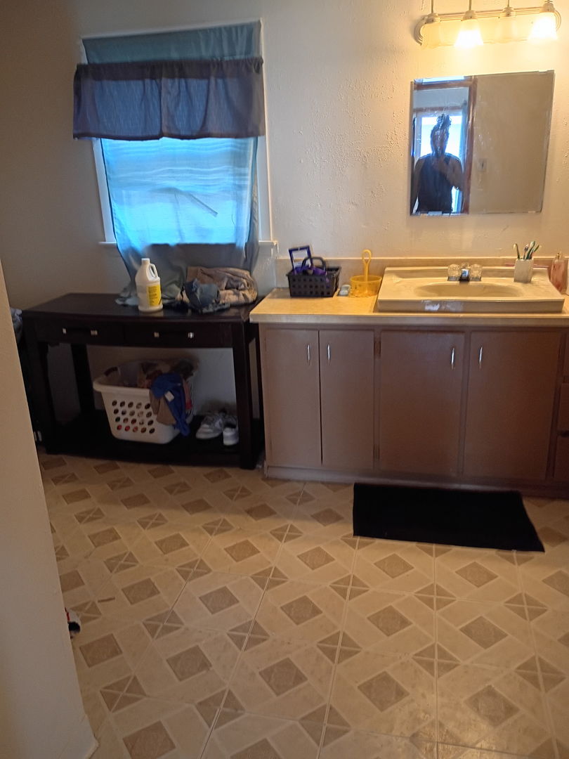 1219 South 7th Street Clinton, IA 52732 - Photo 10 of 15 a room with storage and utility