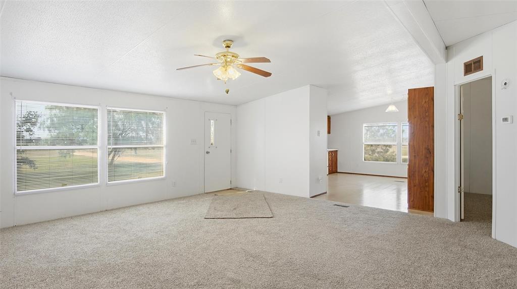 10902 County Road 414 Merkel, TX 79536 - Photo 10 of 26 a view of an empty room with a window