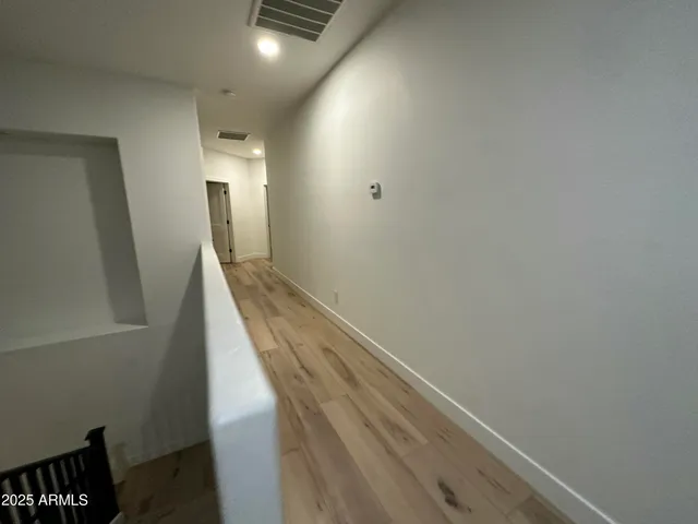 a view of hallway with stairs