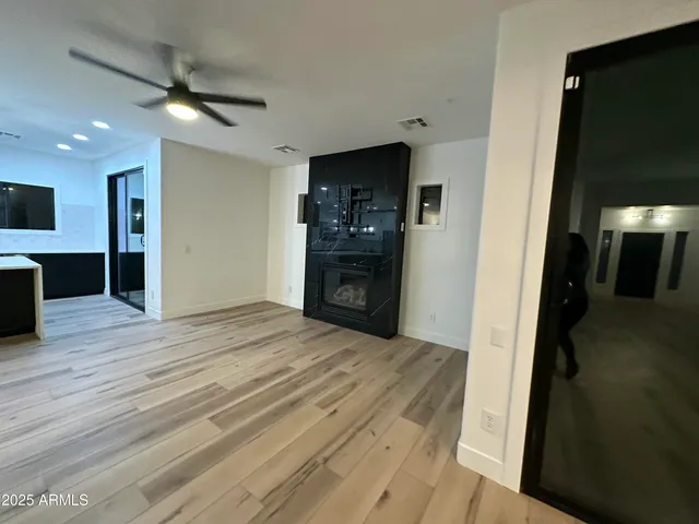 a view of a livingroom with a fireplace