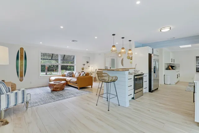 a bathroom with a sink a mirror and a shower