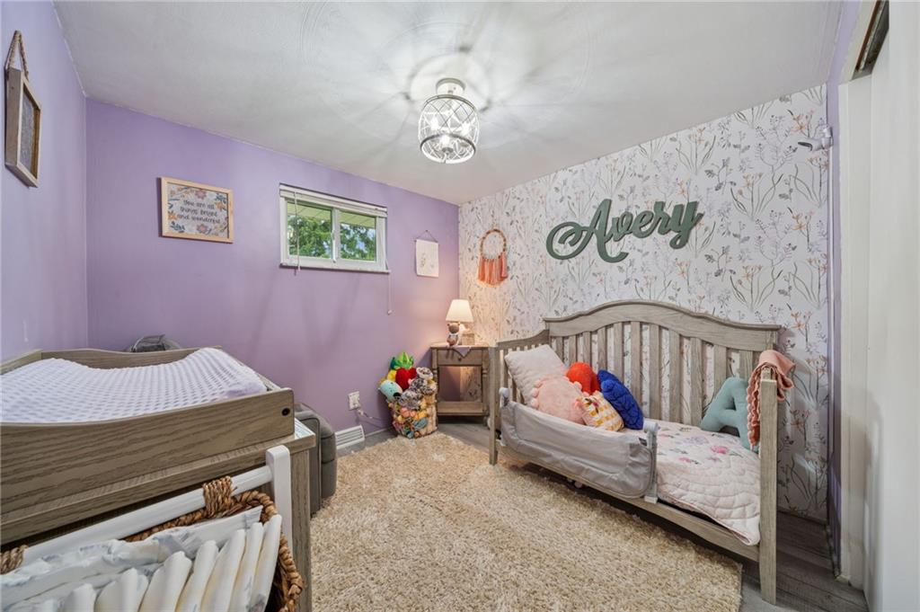 12629 Deborah Drive Irwin, PA 15642 - Photo 14 of 33 a bedroom with a bed and a white bath tub