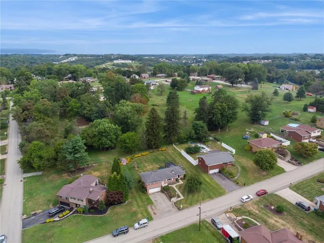 an aerial view of a city with lots of residential buildings