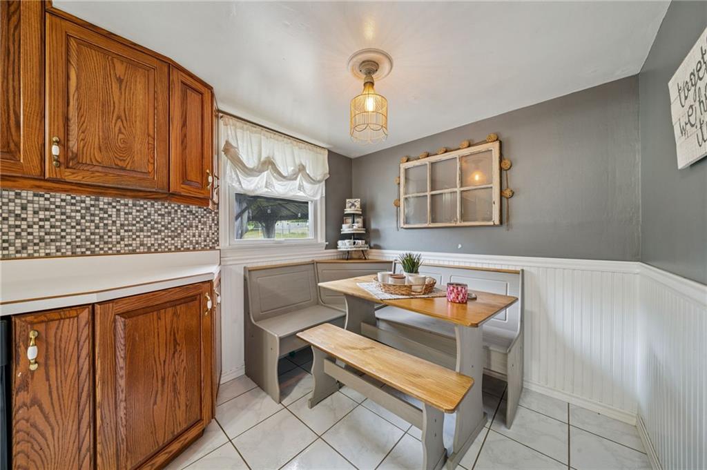 12629 Deborah Drive Irwin, PA 15642 - Photo 7 of 33 a reading room with furniture a chandelier and a window