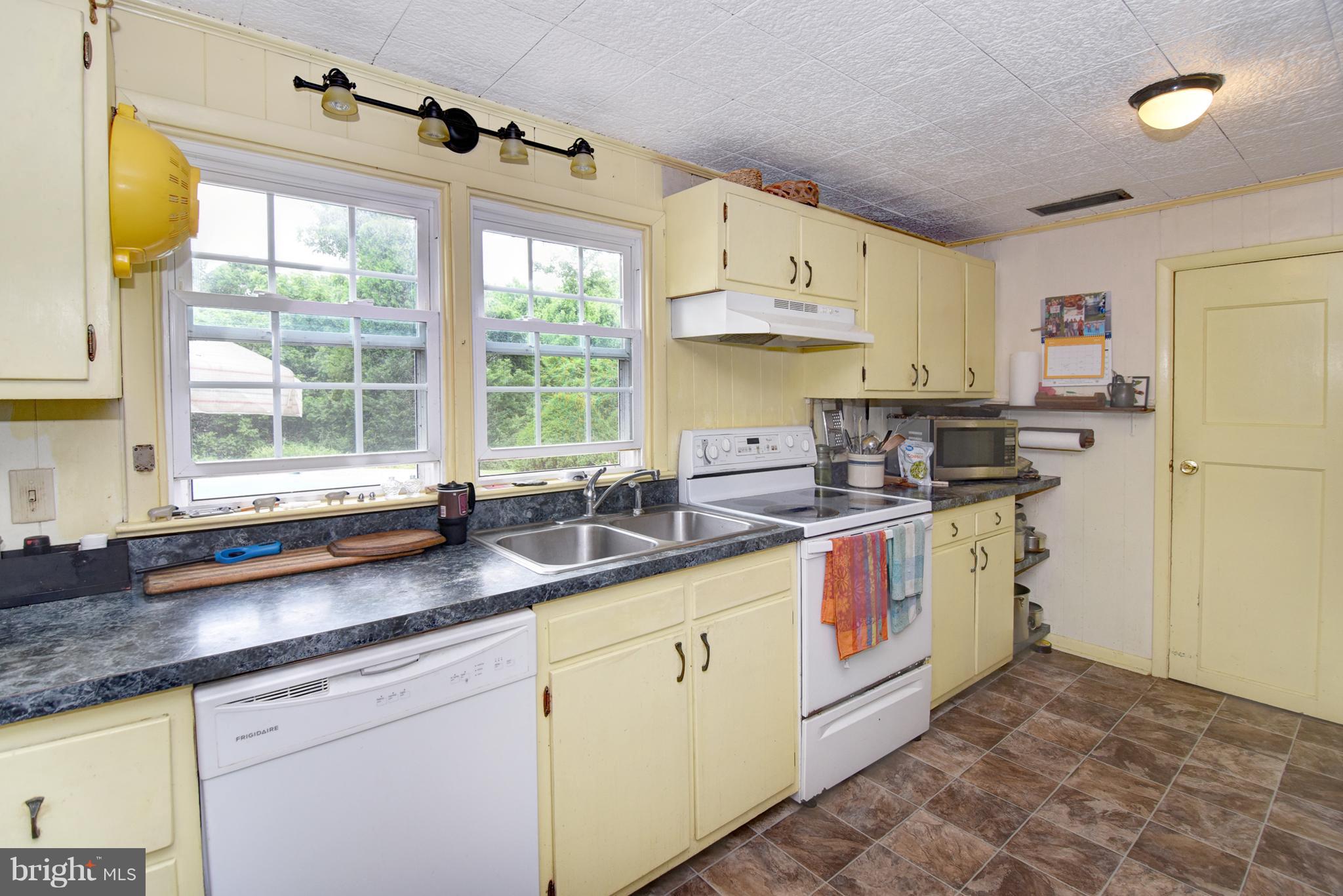 1281 Cedar Corner Road Perryville, MD 21903 - Photo 11 of 30 KITCHEN WITH WINDOWS OVERLOOKING POOL!