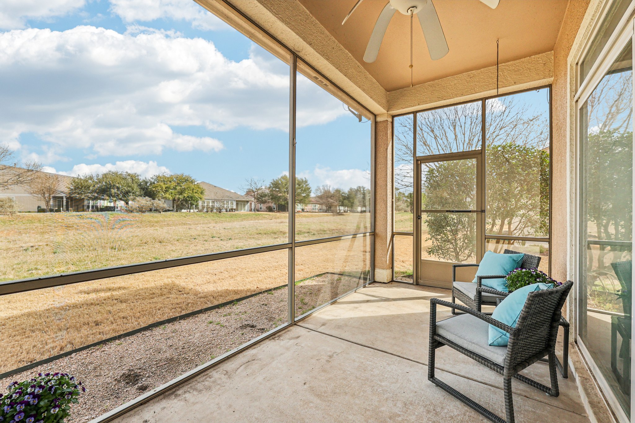 323 Crockett Loop Georgetown, TX 78633 - Photo 28 of 34 Screened & covered, with ceiling fan