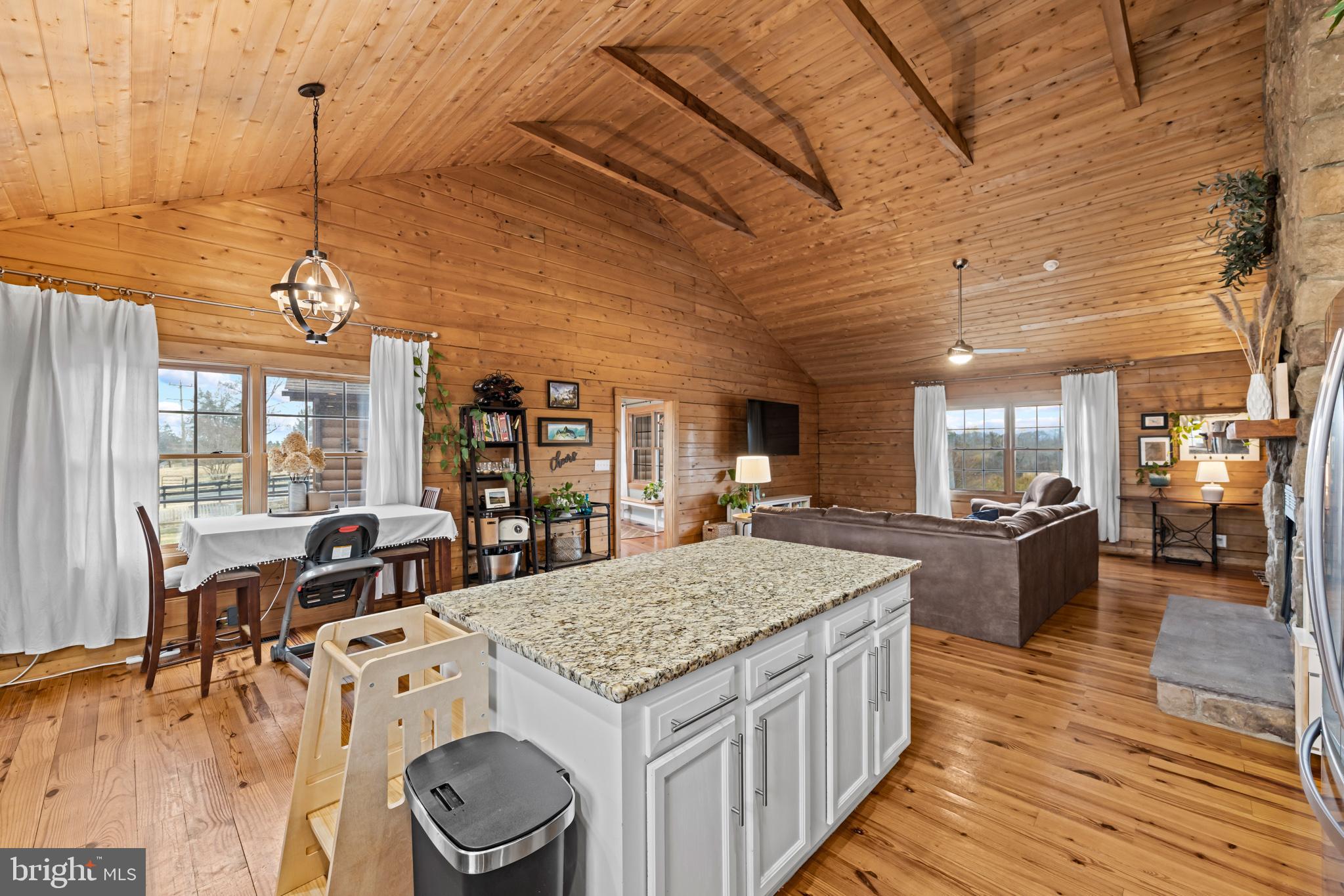 4112 Jacks Shop Road Rochelle, VA 22738 - Photo 15 of 54 a kitchen with a stove and wooden floor