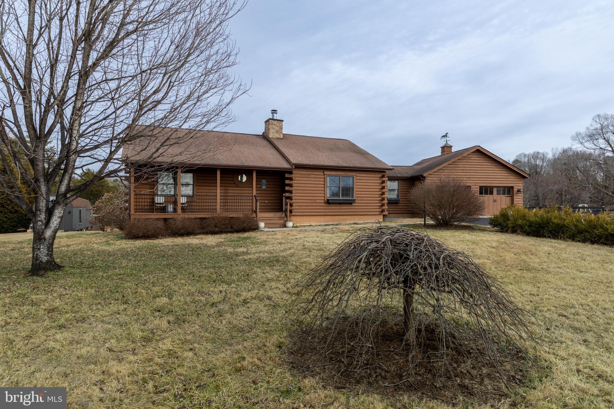 4112 Jacks Shop Road Rochelle, VA 22738 - Photo 2 of 54 a front view of a house with a yard