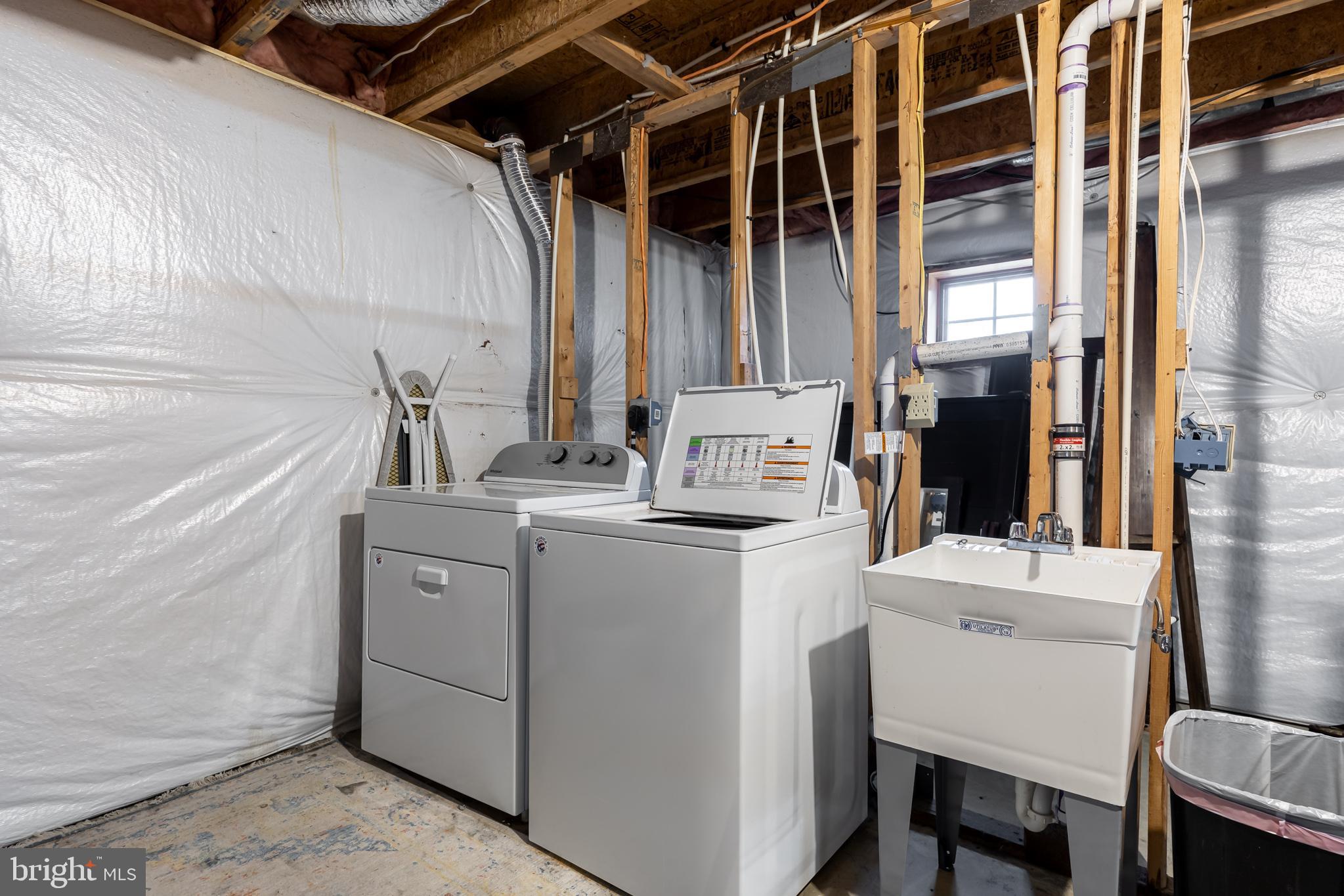 4112 Jacks Shop Road Rochelle, VA 22738 - Photo 23 of 54 a utility room with dryer and washer
