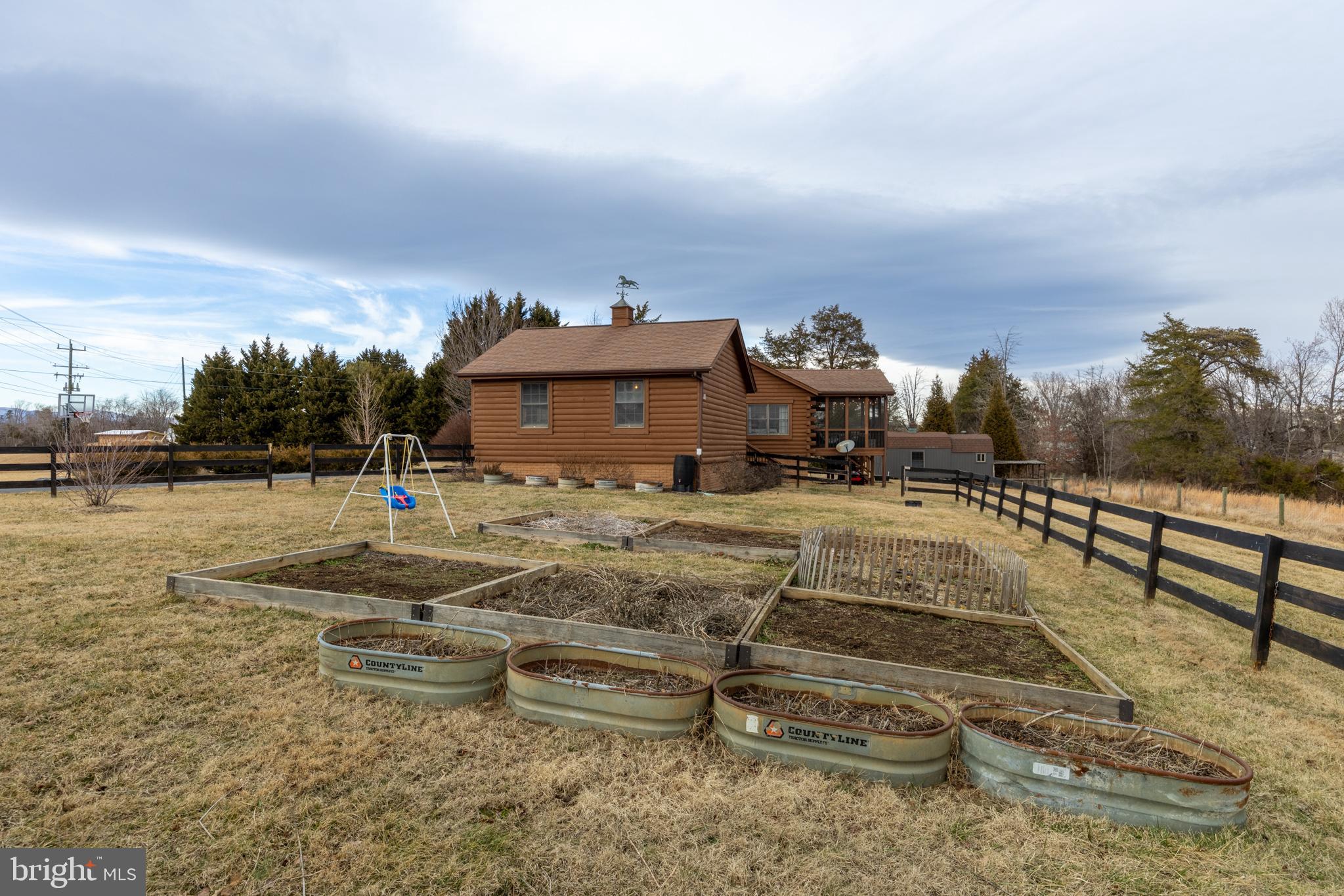 4112 Jacks Shop Road Rochelle, VA 22738 - Photo 35 of 54 a view of a terrace with a bench