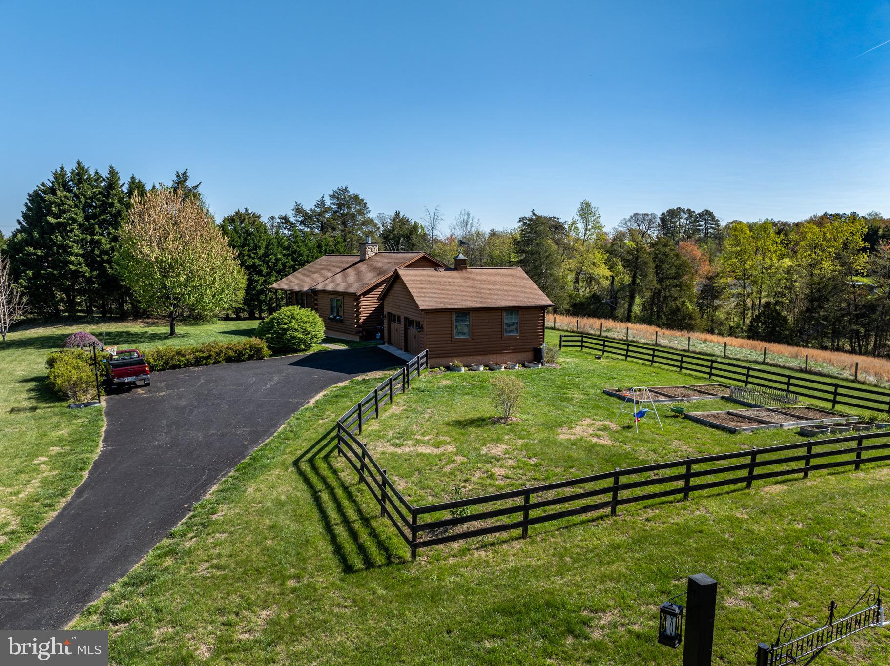 4112 Jacks Shop Road Rochelle, VA 22738 - Photo 4 of 56 a view of a backyard with a garden