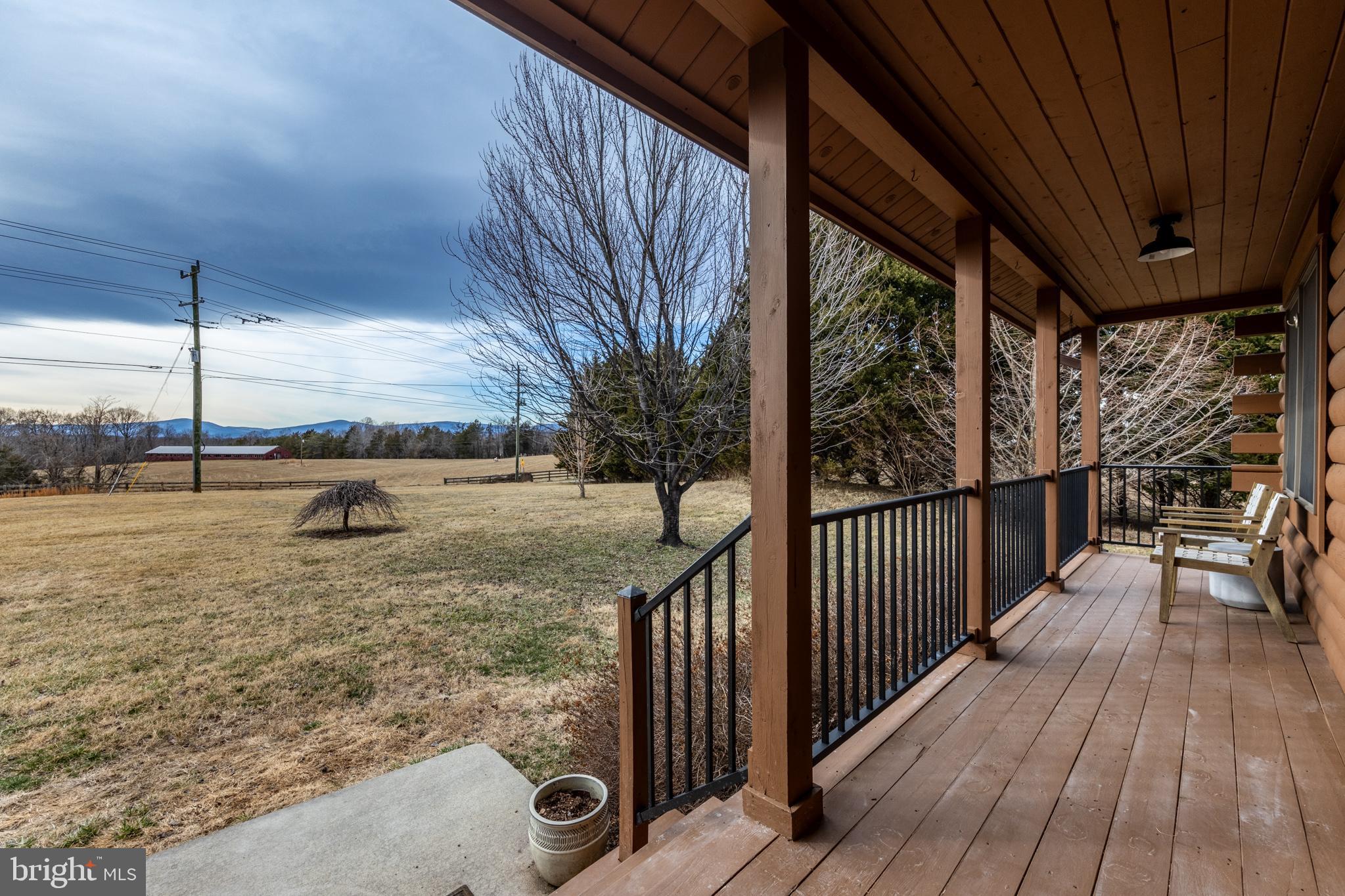 4112 Jacks Shop Road Rochelle, VA 22738 - Photo 5 of 54 a view of a pathway of a house with wooden deck