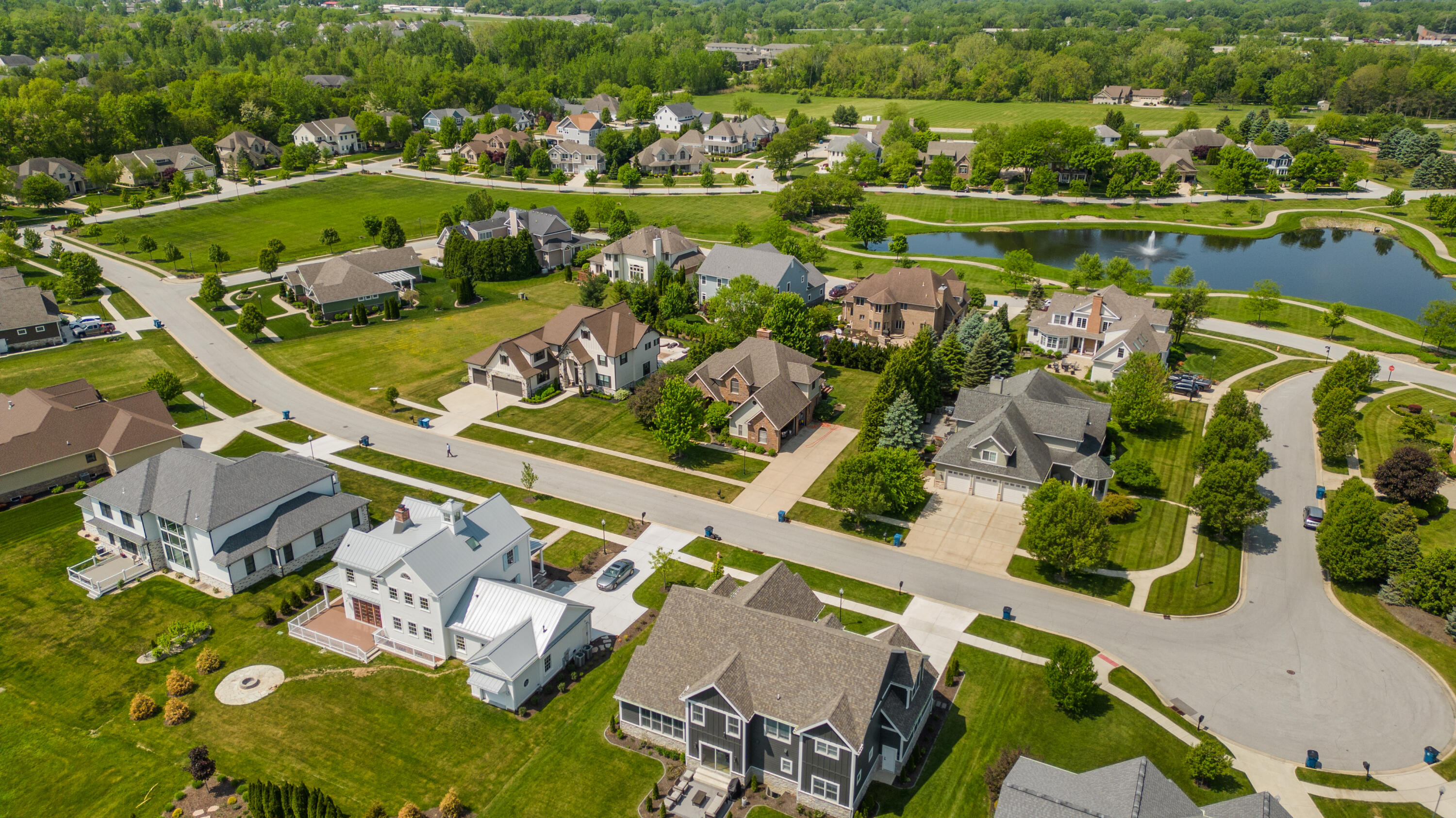 1941 Bramble Trace Chesterton, IN 46304 - Photo 1 of 8 an aerial view of a house with a lake view