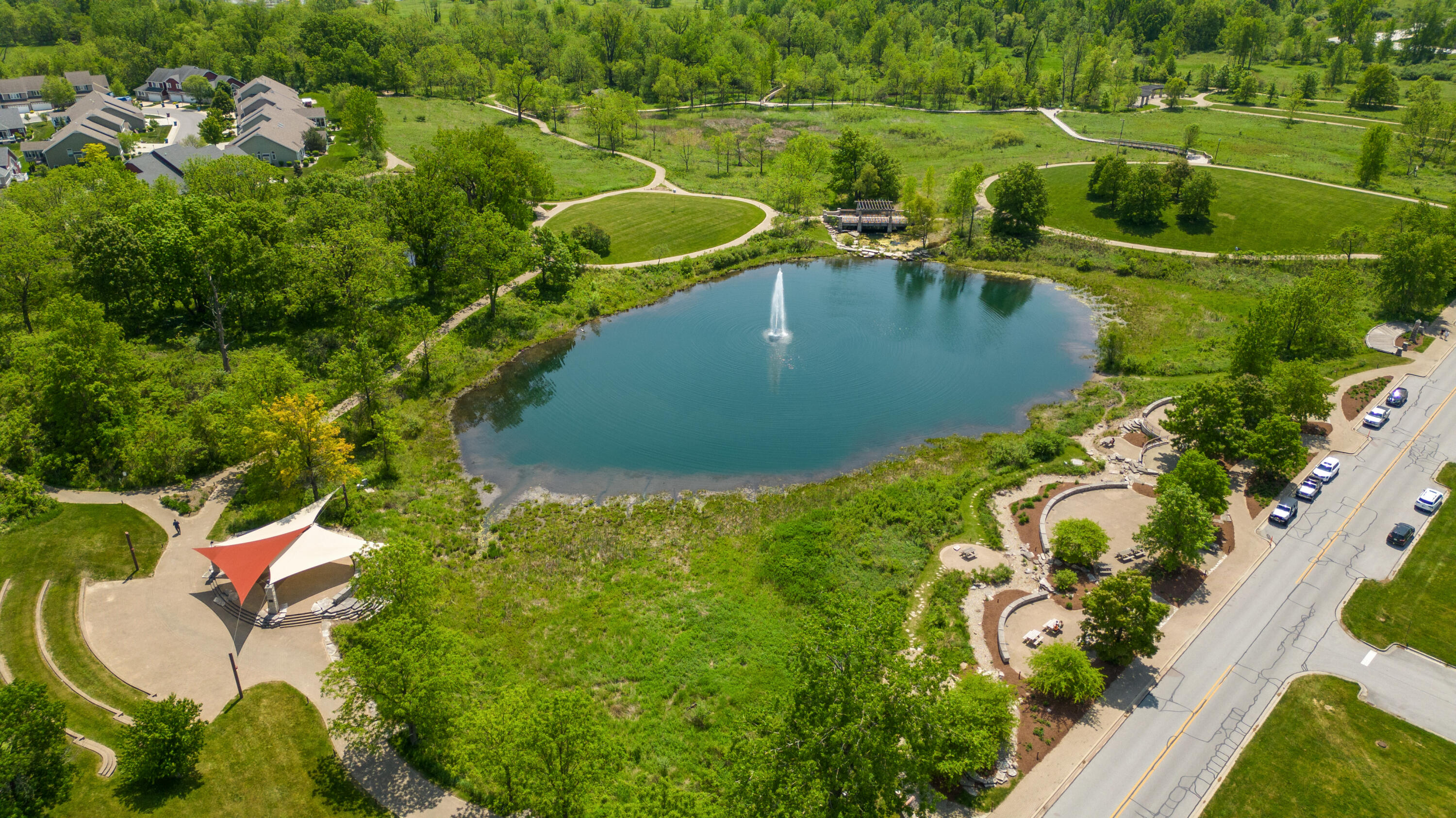 1941 Bramble Trace Chesterton, IN 46304 - Photo 8 of 8 an aerial view of a house with a yard and large trees