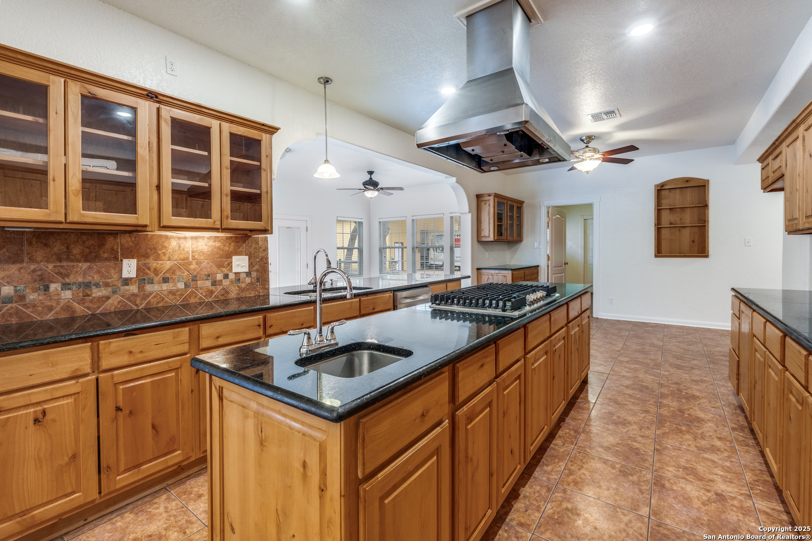 201 Yucca Canyon Spring Branch, TX 78070 - Photo 13 of 40 a kitchen that has a sink and a stove