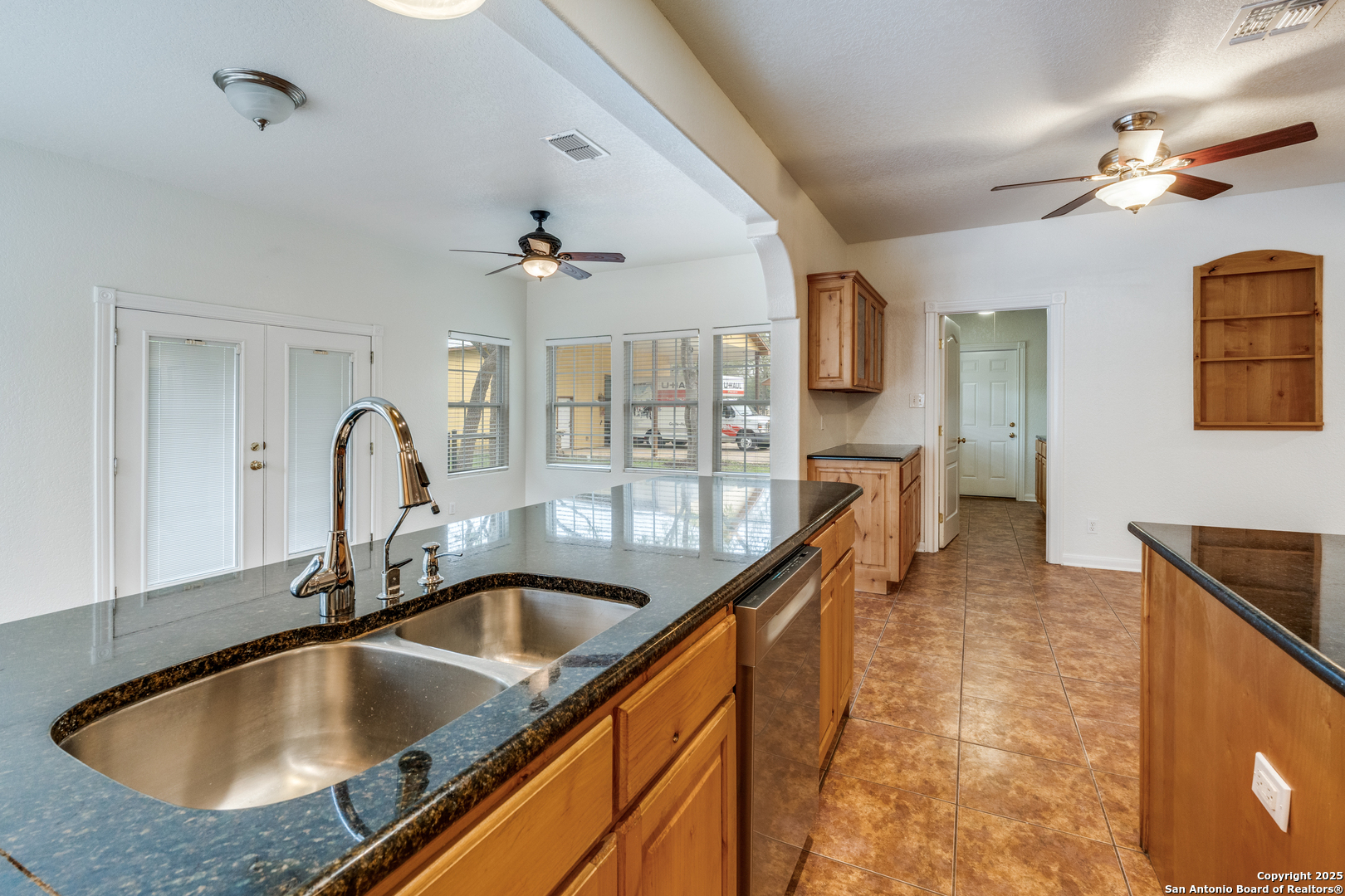 201 Yucca Canyon Spring Branch, TX 78070 - Photo 14 of 40 a kitchen with a sink and chandelier