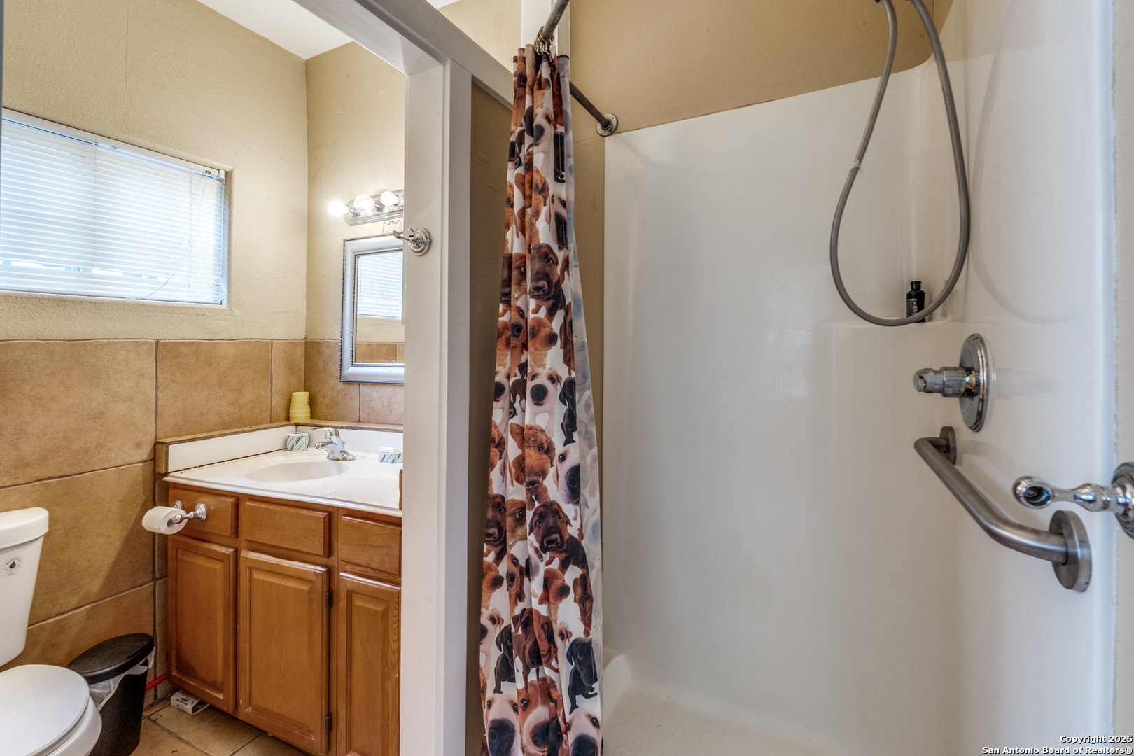 201 Yucca Canyon Spring Branch, TX 78070 - Photo 25 of 40 a bathroom with a sink toilet and shower