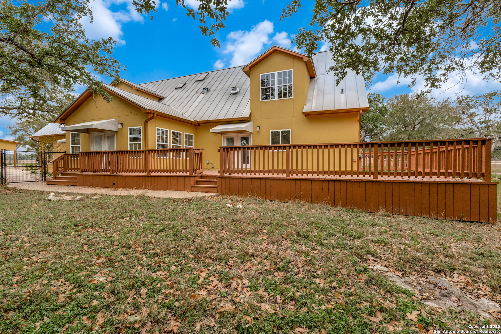 201 Yucca Canyon Spring Branch, TX 78070 - Photo 29 of 40 a view of house with wooden fence