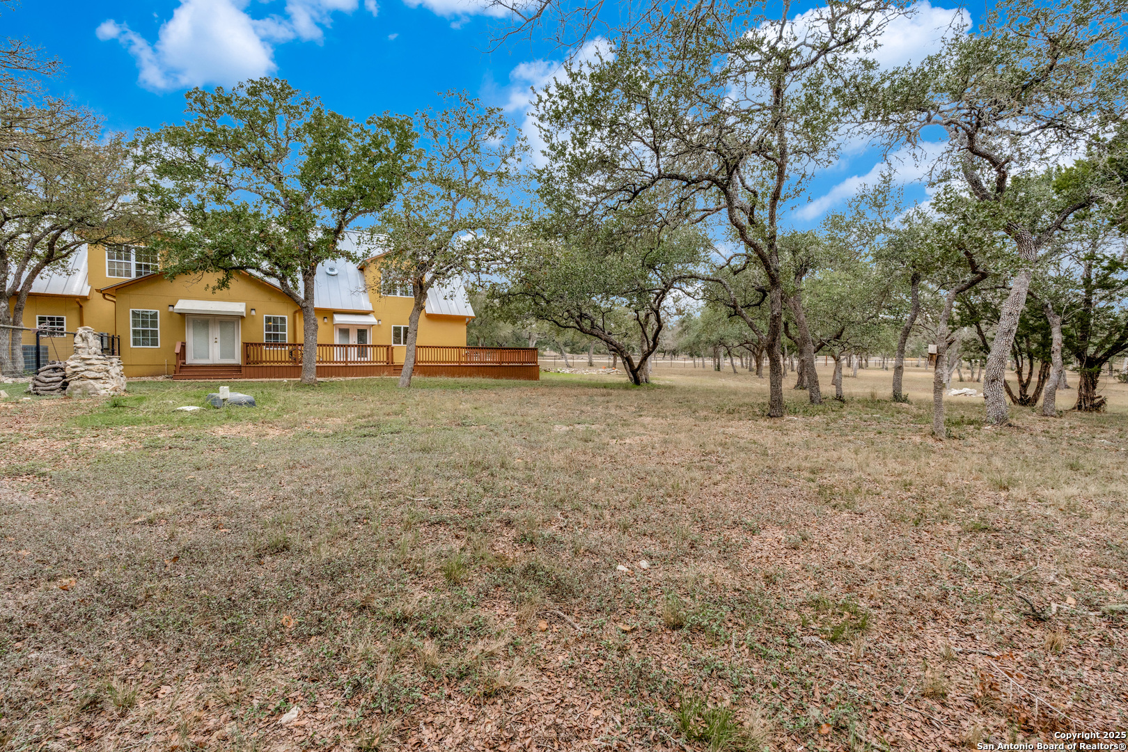 201 Yucca Canyon Spring Branch, TX 78070 - Photo 30 of 40 a view of a yard with a house