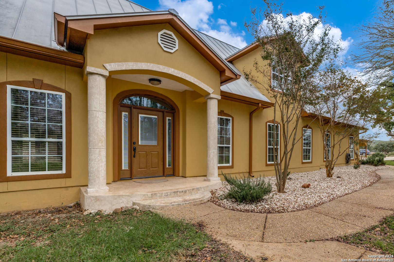 201 Yucca Canyon Spring Branch, TX 78070 - Photo 3 of 40 a view of a house with potted plants