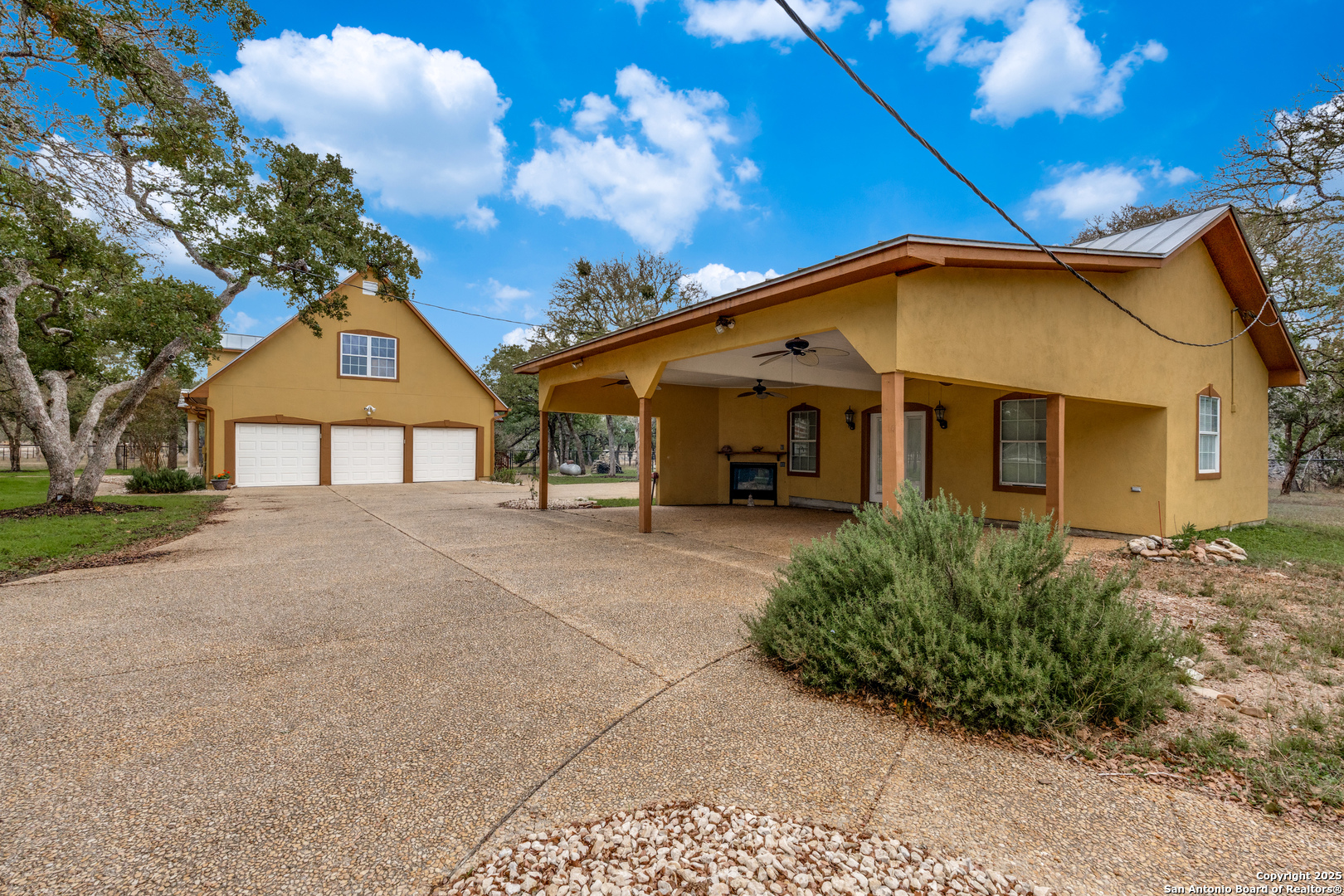 201 Yucca Canyon Spring Branch, TX 78070 - Photo 31 of 40 a front view of a house with garden