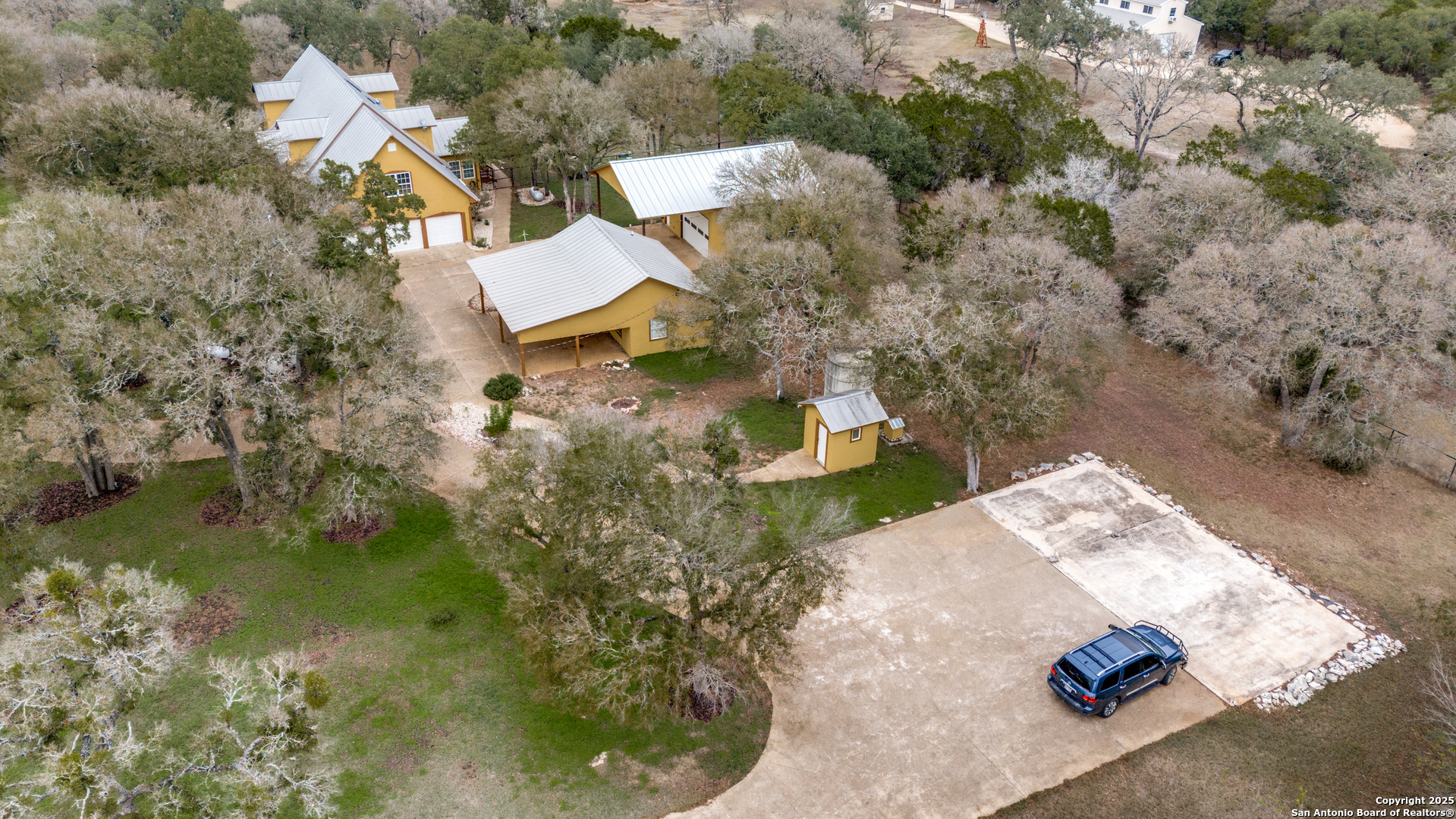 201 Yucca Canyon Spring Branch, TX 78070 - Photo 38 of 40 an aerial view of a house with a yard