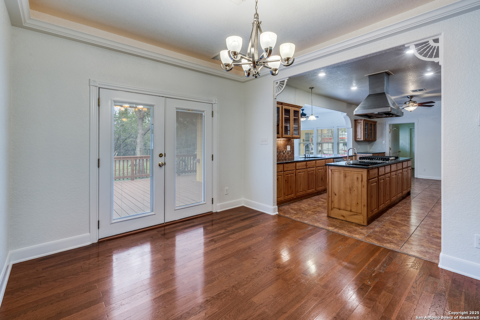 201 Yucca Canyon Spring Branch, TX 78070 - Photo 9 of 40 a view of a kitchen with cabinets and wooden floor