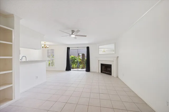 a view of a kitchen with furniture and a fireplace