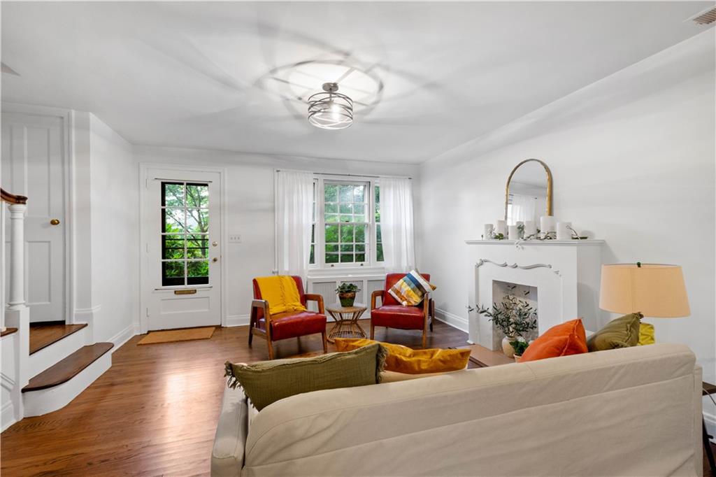 650 Pennridge Road Pittsburgh, PA 15211 - Photo 11 of 33 a living room with furniture and a fireplace