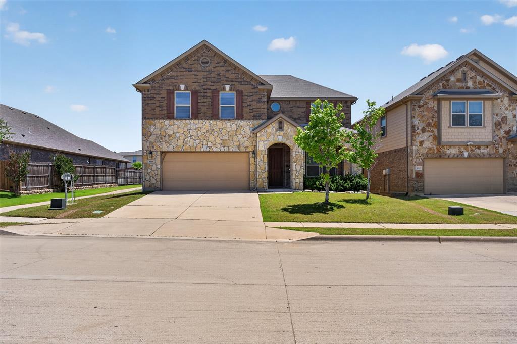8728 Maple Ridge Trail Fort Worth, TX 76244 - Photo 40 of 40 Two-story residential exterior featuring brick and stone masonry