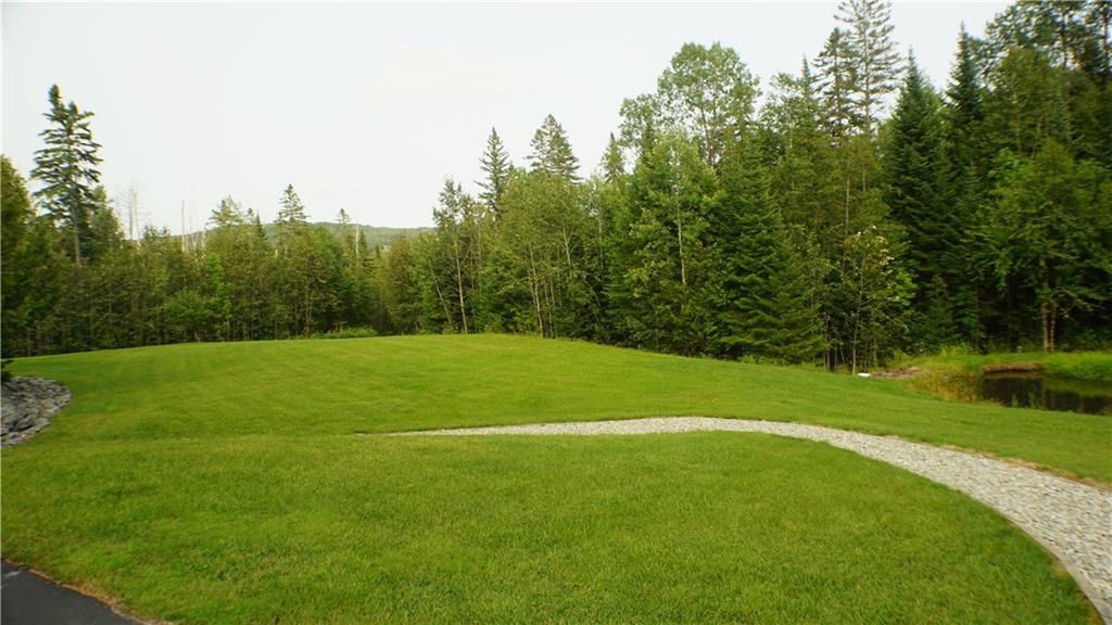 332 Aroostook Road Fort Kent, ME 04743 - Photo 33 of 34 Beautiful yard with pond