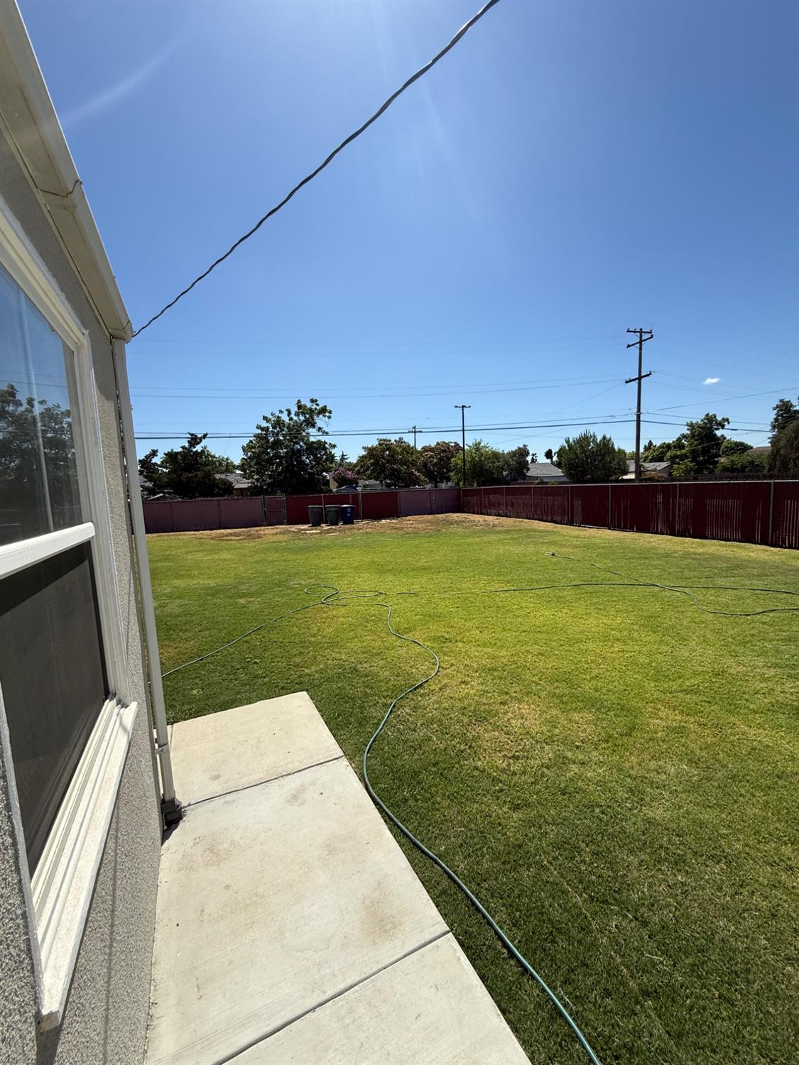 501 Rotan Avenue Madera, CA 93637 - Photo 15 of 23 a view of a garden with lawn chairs