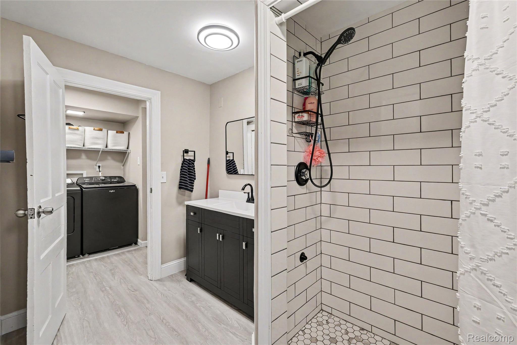 306 Mill Street Pinckney, MI 48169 - Photo 14 of 29 Fully updated bathroom with walk in tiled shower