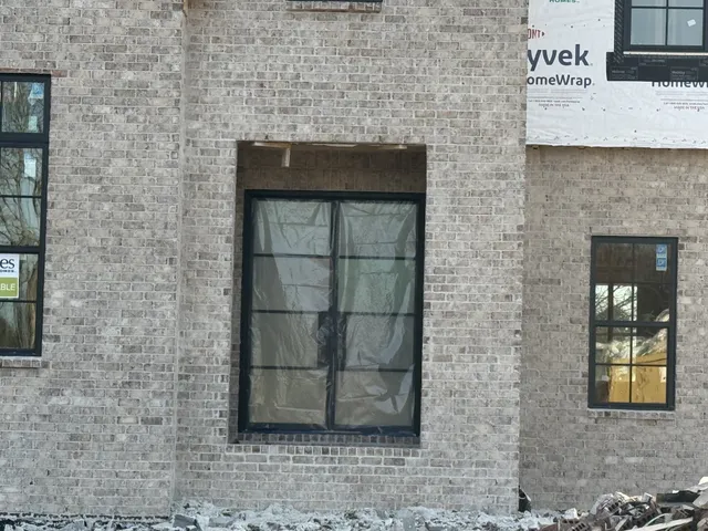 a house with trees in the background