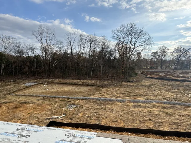 a view of entryway with a front door