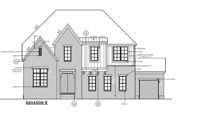 a black and white photo of a living room