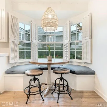 a dinning table tennis table and windows