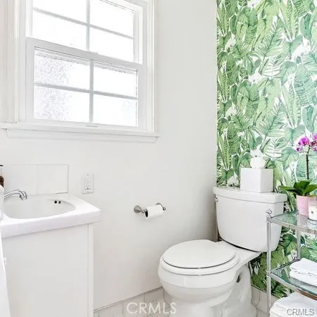 a front view of house with yard and seating