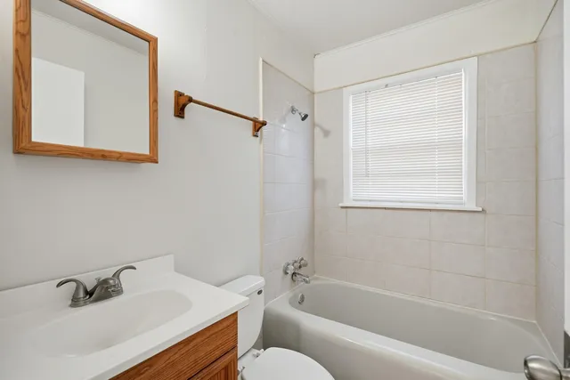 a bathroom with a sink and a bathtub