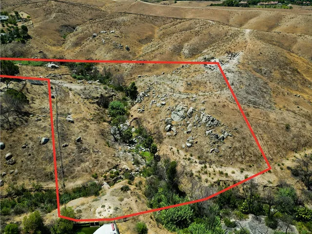 a view of a water with a mountain in the background