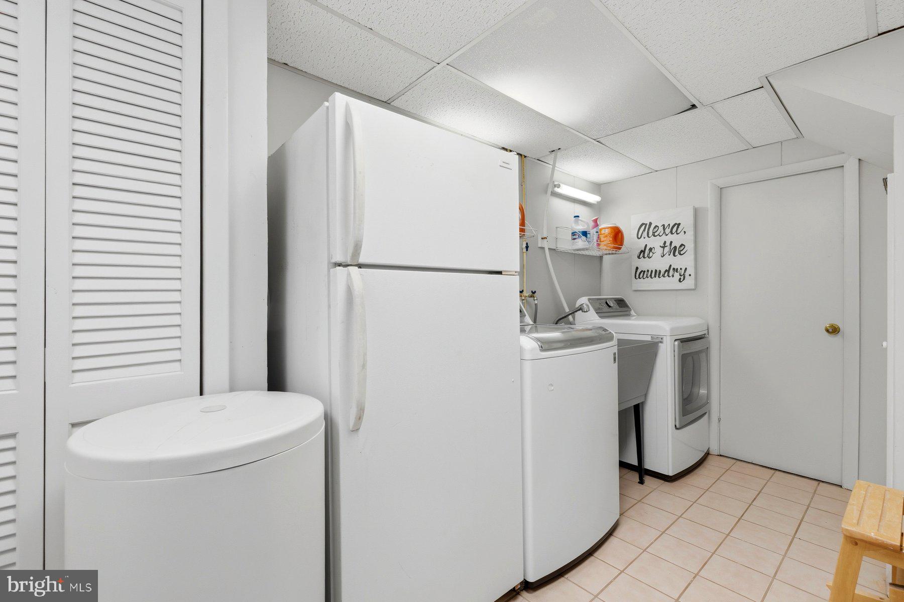 15200 Berryville Road Germantown, MD 20874 - Photo 33 of 42 a utility room with dryer and washer