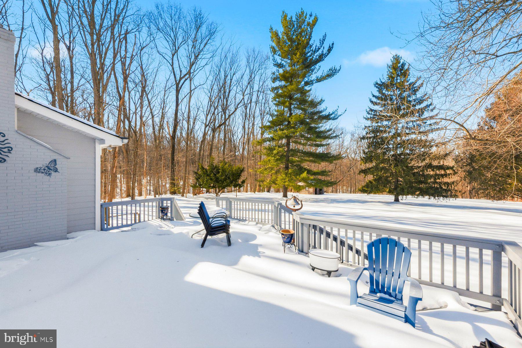 15200 Berryville Road Germantown, MD 20874 - Photo 8 of 42 a view of a patio with couches table and chairs and potted plants